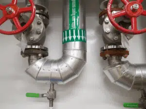 Cooling water system showing grounding method to prevent pipe corrosion